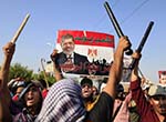 Egypt Police Clash  with Islamist Supporters
