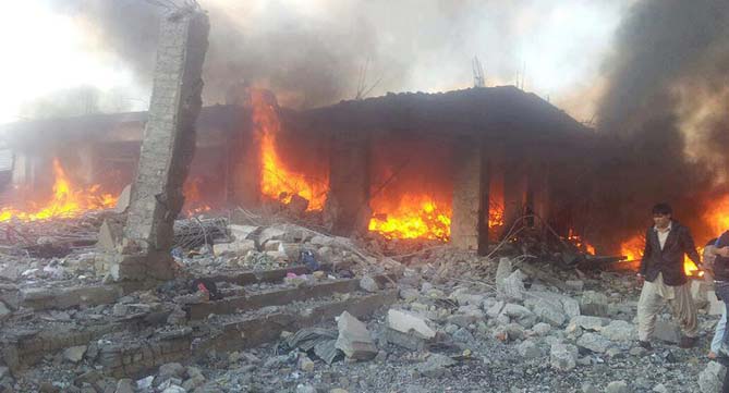 shops and markets set on fire when a bomb exploded in hazara towb quetta