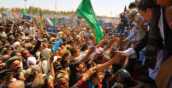 Abdullah Vows Peace in First Runoff Rally