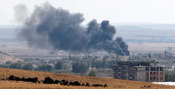 Kurdish Peshmerga Arrive with Weapons in Syria's Kobani