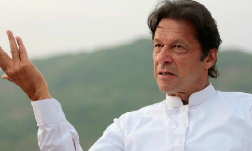 Khan Pleads for Political  Settlement in Afghanistan