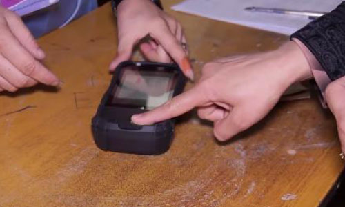Observers Skeptical as IEC Reports Progress on Biometric Devices