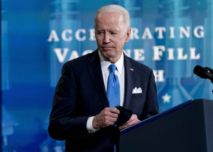 Biden Boosts US Vaccine Stockpile as World Waits