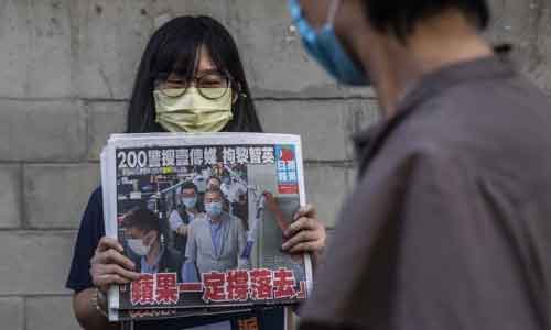 Hong Kong’s Apple Daily Vows to  ‘Fight on’ After Lai’s Arrest