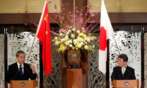Japan and China to continue communications on East China Sea, Japan says