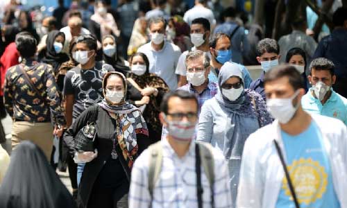 Iran reports record high COVID death toll as travel bans go into force