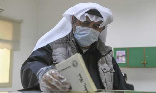 Kuwait votes for parliament amid economic,  virus challenges