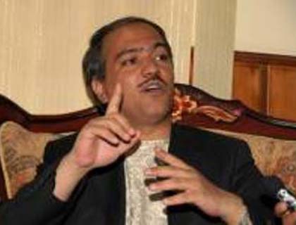 Karzai Trying to Dissolve Parliament: Behzad