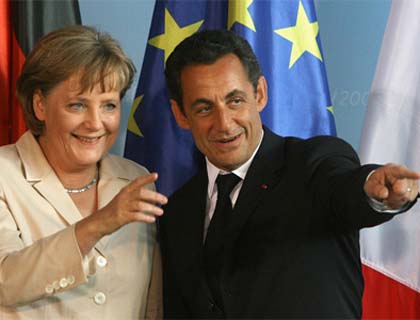 Merkel, Sarkozy  Stress Growth A Priority in Crisis